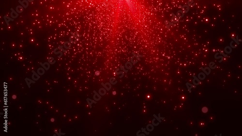 falling red glitter particles background of red light. Seamless loop.

