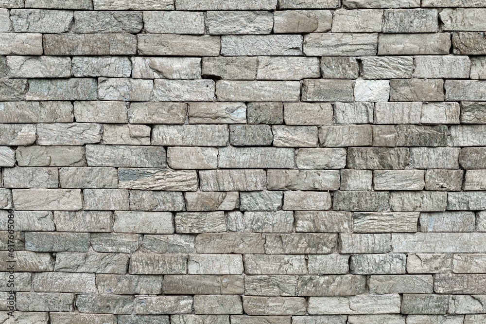 Gray stone brick wall. Background and texture, full frame. Gray stone brick wall. Background and texture, full frame.