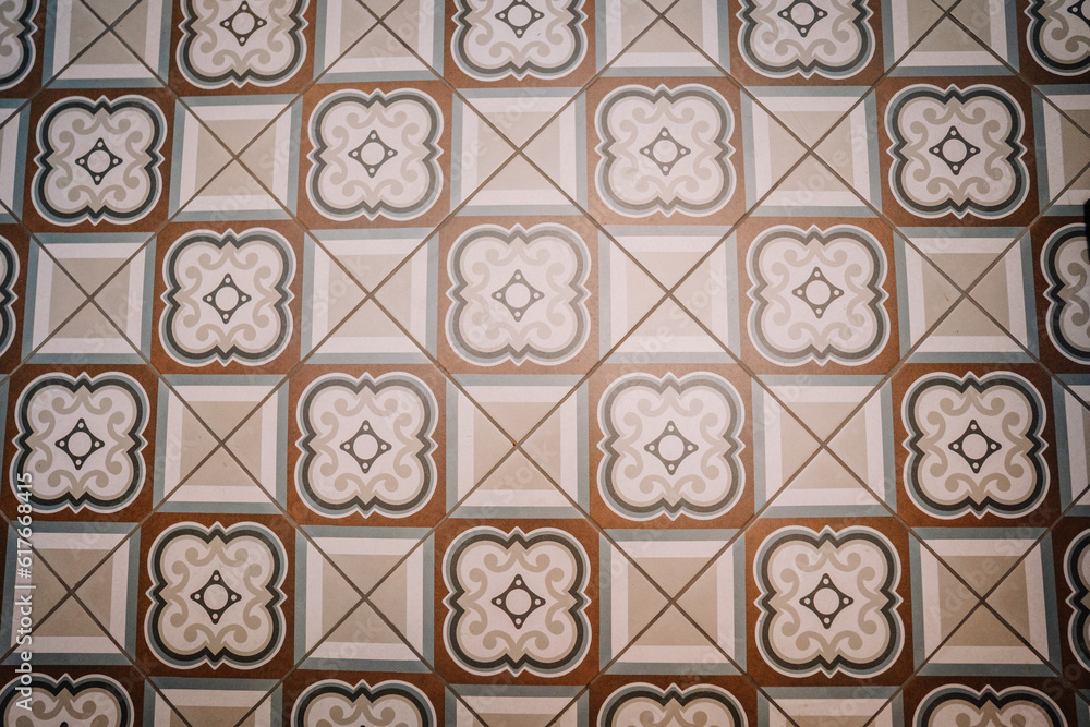 brown patterned tiled floor shot from above
