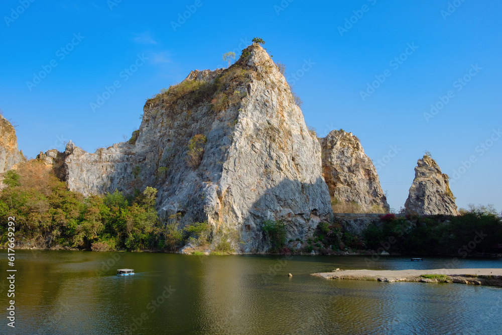 Beautiful nature scenic landscape with the mountain range of blue sky in Khao Ngu Stone Park at Chom Bueng, Suan Phueng, Ratchaburi, Thailand. It is a cave and religious monument regarding Buddhism.