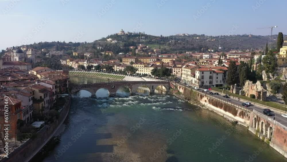 Cityscape aerial shot from flying drone of a developed Verona city with classic buildings Cityscape aerial shot from flying drone of a developed Verona city with classic buildings