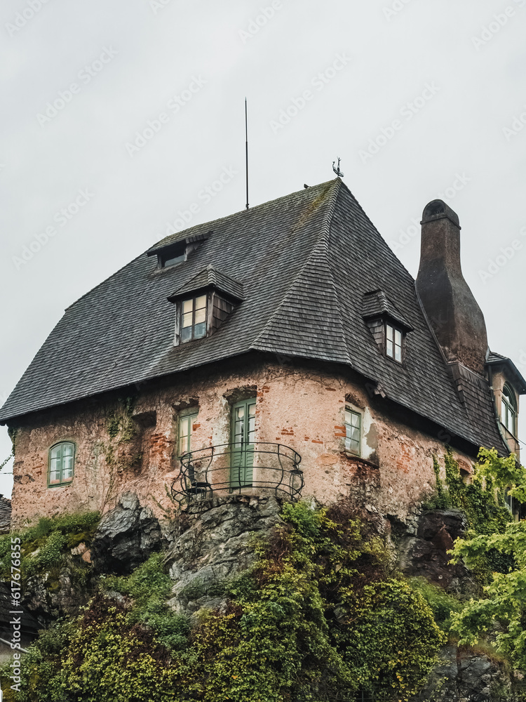 Unusual old house on top of a cliff