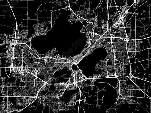 Vector road map of the city of  Madison Wisconsin in the United States of America with white roads on a black background.