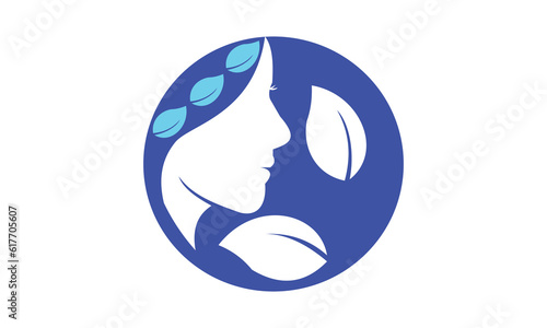 Female face vector illustration logo with leaves as a symbol of beauty salon