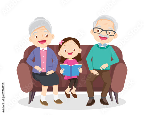 grandparents sitting listening to grandchildren read book