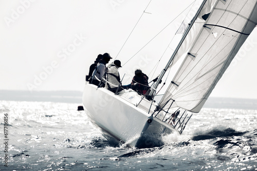 Silhouette of yacht in rough sea during regatta competition