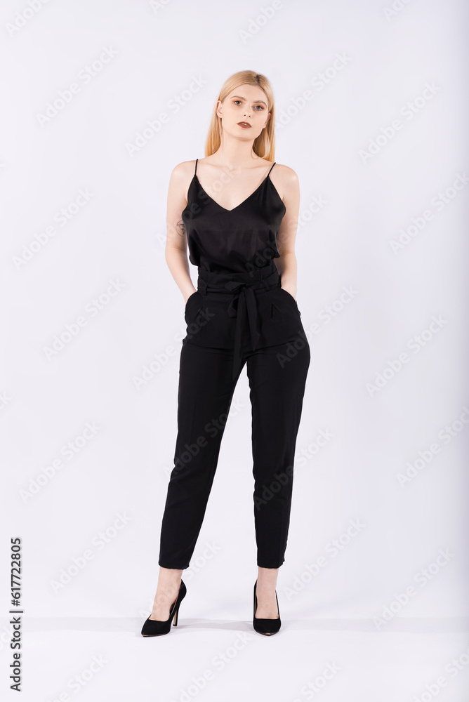 Portrait of an elegant and beautiful blonde girl on a white background Portrait of an elegant and beautiful blonde girl on a white background