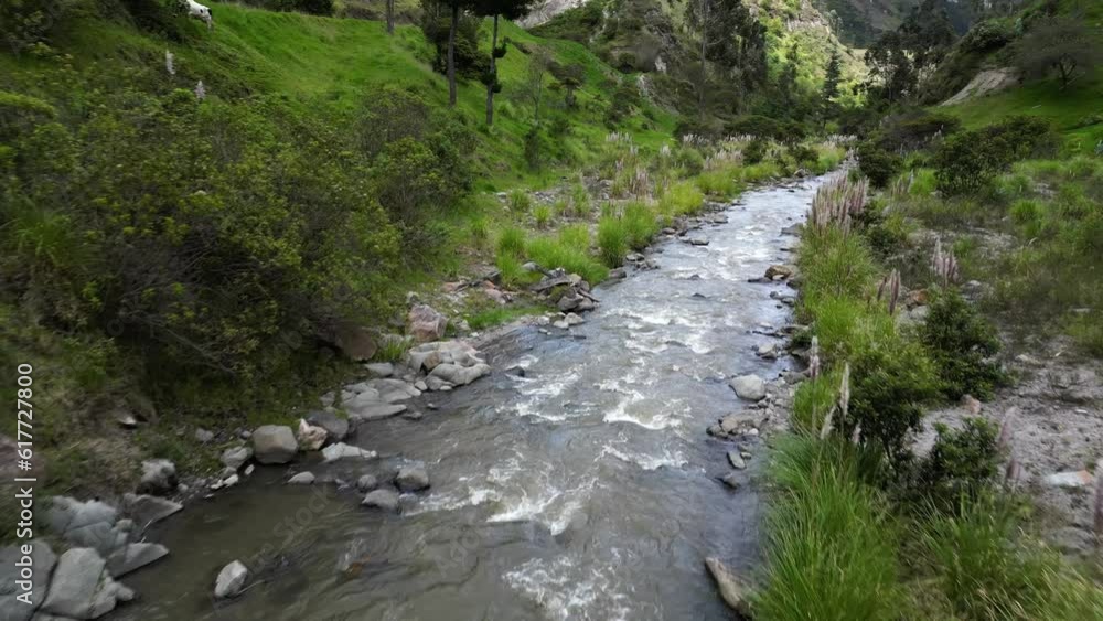 Drone view flying along river in the Andes Mountains in Ecuador Drone view flying along river in the Andes Mountains in Ecuador
