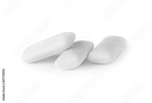 Many tasty chewing gums on white background