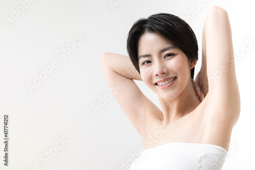 Image of underarm hair removal  esthetics and beauty treatments Looking at the camera