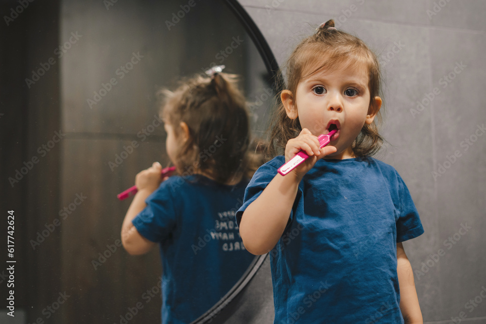 Little boy brushing teeth brushing teeth with lollipop Little boy brushing teeth brushing teeth with lollipop