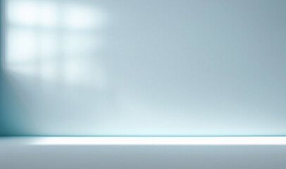 Minimal abstract light blue background for product presentation. Shadow and light from windows on plaster wall.