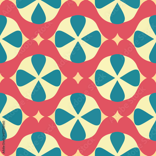 Colorful geometric pattern with blue and red peppermint motif on white background.