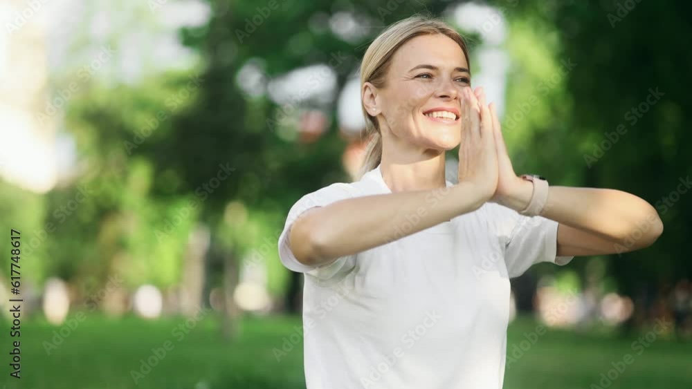 Relaxed mature blond woman meditate and breathe slowly while make yoga asanas at park Calm inspired female with closed eyes take break while resting for peaceful mind alone outdoors Relaxed mature blond woman meditate and breathe slowly while make yoga asanas at park Calm inspired female with closed eyes take break while resting for peaceful mind alone outdoors