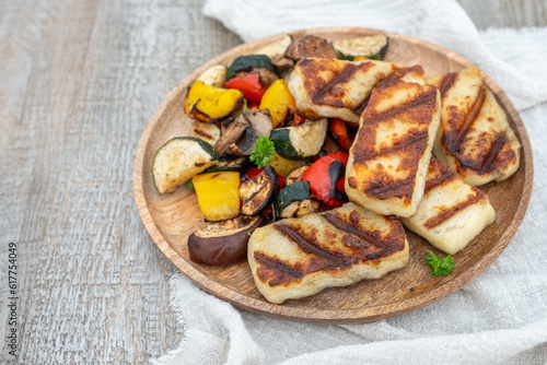 Grilled colorful vegetable : bell pepper, zucchini, eggplant with halluomi cheese on a plate