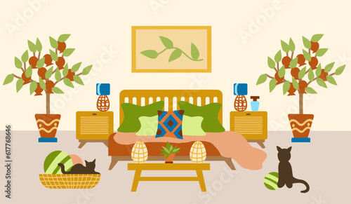The interior of the bedroom with a large bed, a banquette, pomegranate trees and cats, and boho-style furniture. Vector illustration in a flat hand-drawn style. Eco-friendly interior