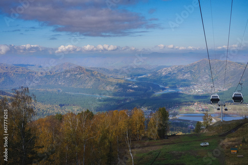 funicular on the background of mountains in autumn. Manzherok Resort, Altai, Russia