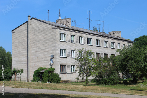 Soviet era apartment building in Birini, Latvia photo