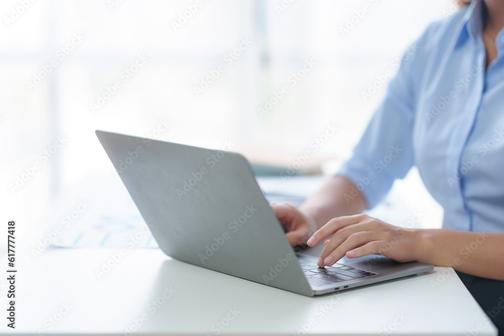 Businesswoman hands typing on laptop computer. Focused Businesswoman Typing on Laptop Computer in Modern Office. Successful Online Work and Digital Communication Businesswoman hands typing on laptop computer. Focused Businesswoman Typing on Laptop Computer in Modern Office. Successful Online Work and Digital Communication