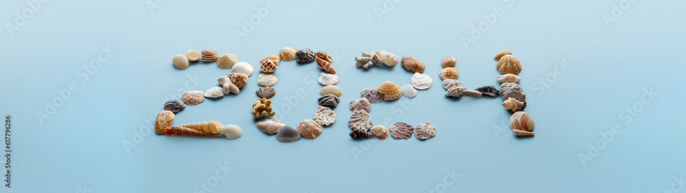 2024 made by seashells. New year holidays in tropics. 2024 made by seashells. New year holidays in tropics.