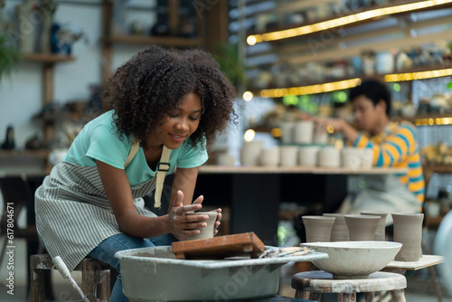 Follow the journey of an African American boy as he discovers the art of sculpting wonders in a vibrant ceramic workshop, channeling his imagination into beautiful clay creations.
