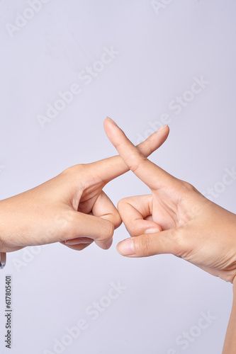 hands holding a finger say no