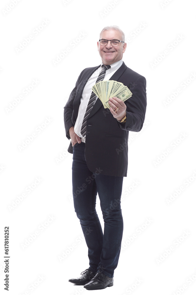 in full growth. happy businessman showing a lot of cash bills in full growth. happy businessman showing a lot of cash bills