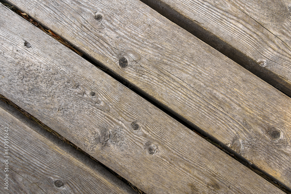 Obraz premium Diagonal rough wooden boarding outdoors.