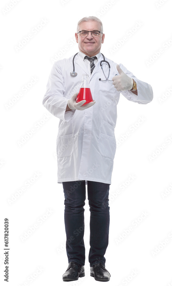 in full growth. a smiling doctor with a laboratory flask in full growth. a smiling doctor with a laboratory flask