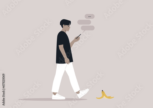 Young male Asian character addicted to their smartphone ignoring a banana peel on their way