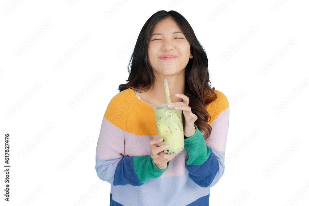 Beautiful young woman smiling happily while holding bubble tea in her hand Beautiful young woman smiling happily while holding bubble tea in her hand