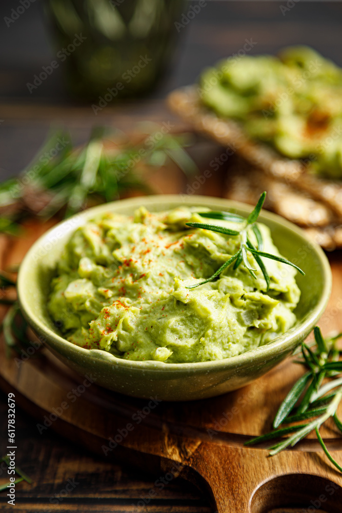 Avocado guacamole in a bowl Avocado guacamole in a bowl