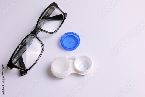 Contact lenses for correcting vision against a light background. 