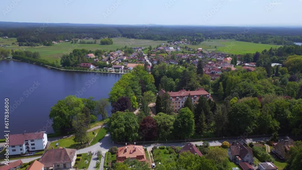 rural village Chlum lake czech republic. Smooth aerial top view flight drone rural village Chlum lake czech republic. Smooth aerial top view flight drone