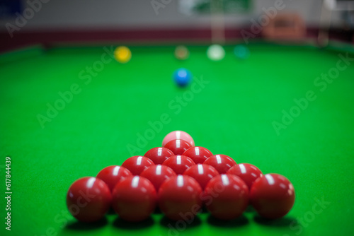 Snooker balls set on a grean cloth table
