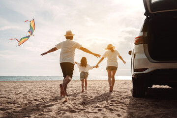 Family happy traveling enjoy in vacation with Car travel driving road trip summer vacation in car in the sunset, Dad, mom and daughter  holidays and relaxation together get the atmosphere.