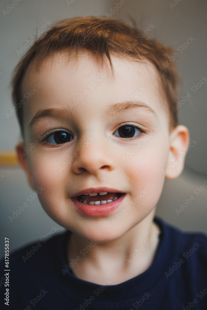 Emotions on the face of a two-year-old little boy, an emotional child. A boy with different grimaces on his face.