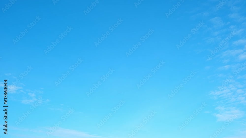A mesmerizing timelapse captures the enchanting dance of puffy white clouds across a serene, endless blue sky, painting a breathtaking masterpiece of nature's ever-changing beauty. Time-lapse. 4K HDR
A mesmerizing timelapse captures the enchanting dance of puffy white clouds across a serene, endless blue sky, painting a breathtaking masterpiece of nature's ever-changing beauty. Time-lapse. 4K HDR