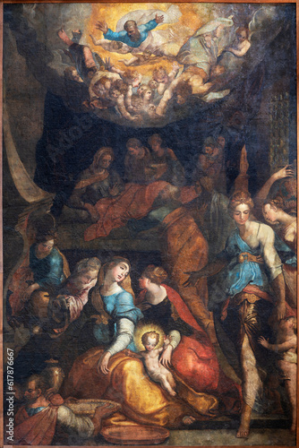 NAPLES, ITALY - APRIL 21, 2023: The painting of Nativity of Virgin Mary in the church Chiesa dei Santi Severino by Marco Pino da Siena (1521–1583).