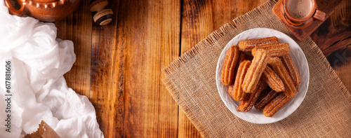 Churros. Fried wheat flour dough, a very popular sweet snack in Spain, Mexico and other countries. It is customary to eat them for breakfast or snack accompanied by hot chocolate . Table topview