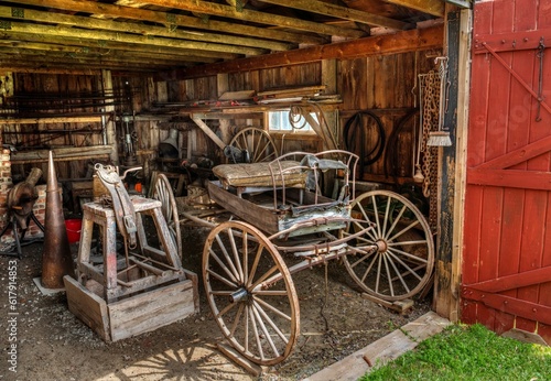 old fashioned horse drawn wagon in a barn Scugog Shores Port Perry Ontario photo