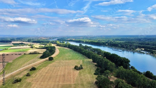 Aerial view of the river Rhine with beautiful scenery and a boat