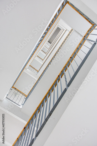 Looking up through staircase. Conceptual for vertigo and fear of heights
