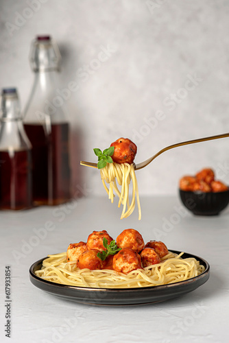 Food photography of meatball, chicken, beef; meat, spaghetti, pasta, tomato, sauce, basil, veal, fried, grilled, roasted, fork