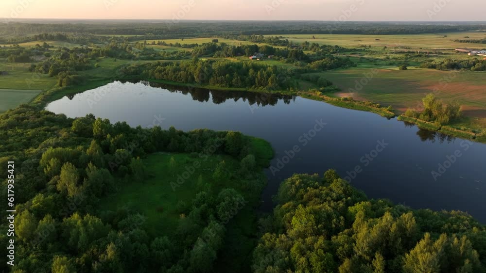 Lake in rural aerial view. Wild pond near village. Rural landscape, drone view. Wildlife Scenery. Refuge Wetland Restoration, groundwater. Freshwater scarcity, Ecosystem. Global drought crisis Lake in rural aerial view. Wild pond near village. Rural landscape, drone view. Wildlife Scenery. Refuge Wetland Restoration, groundwater. Freshwater scarcity, Ecosystem. Global drought crisis