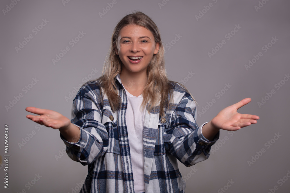 Portrait of happy beautiful woman, isolated on gray background Portrait of happy beautiful woman, isolated on gray background