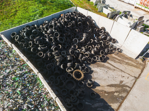 фотографія Heap of old used industrial rubber tires specially selected from the garbage in