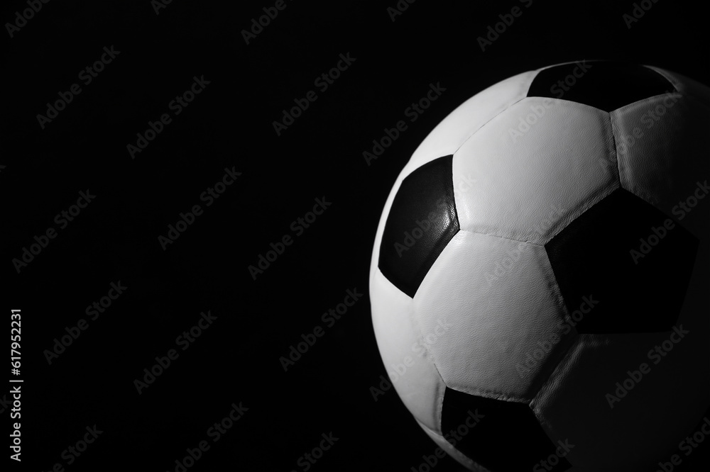 Soccer ball detail on black background. Horizontal sport theme poster, greeting cards, headers, website and app.