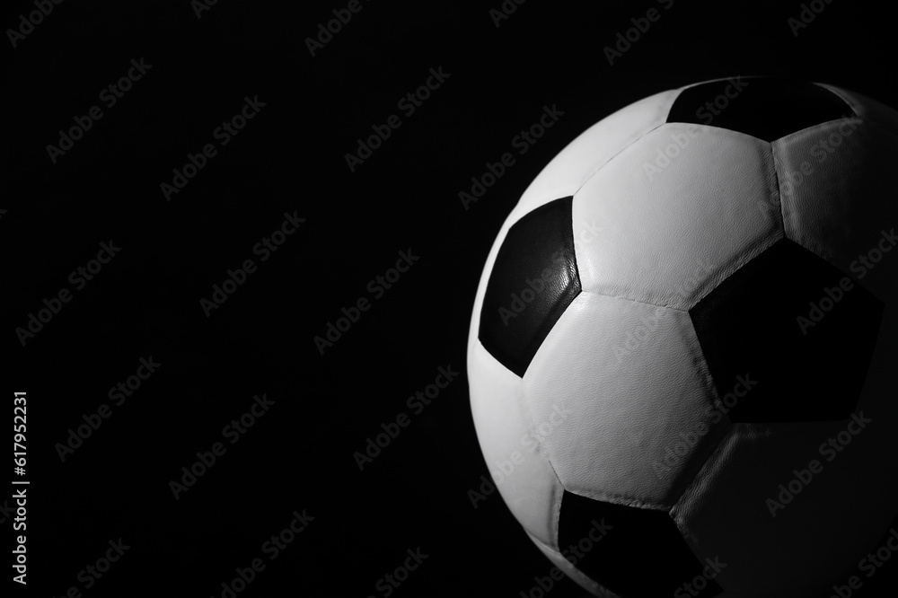 Soccer ball detail on black background. Horizontal sport theme poster, greeting cards, headers, website and app. Soccer ball detail on black background. Horizontal sport theme poster, greeting cards, headers, website and app.