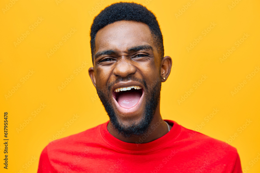 Obraz premium man african orange fashion american smiling guy happy red black american background portrait